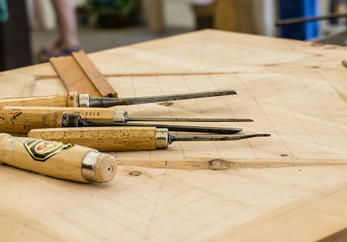 chisels on a workbench